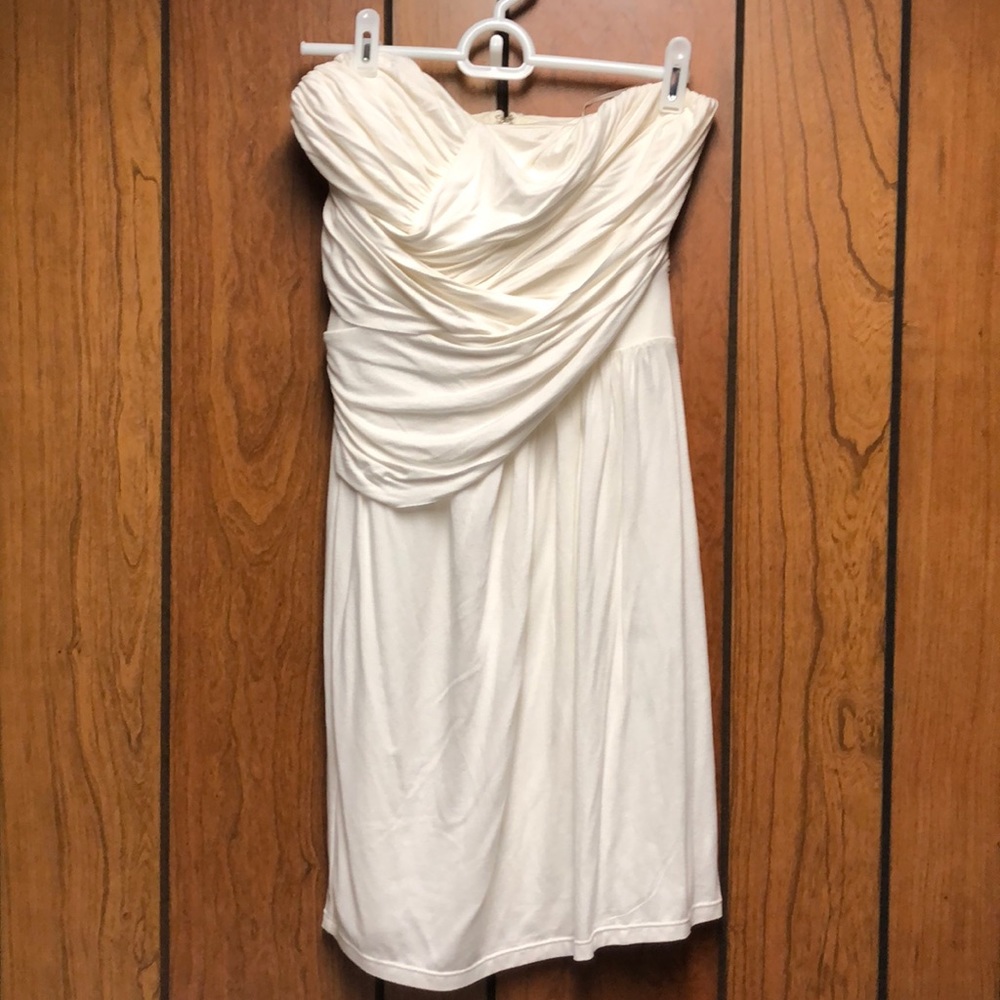 Ivory ruched strapless mini dress by Express